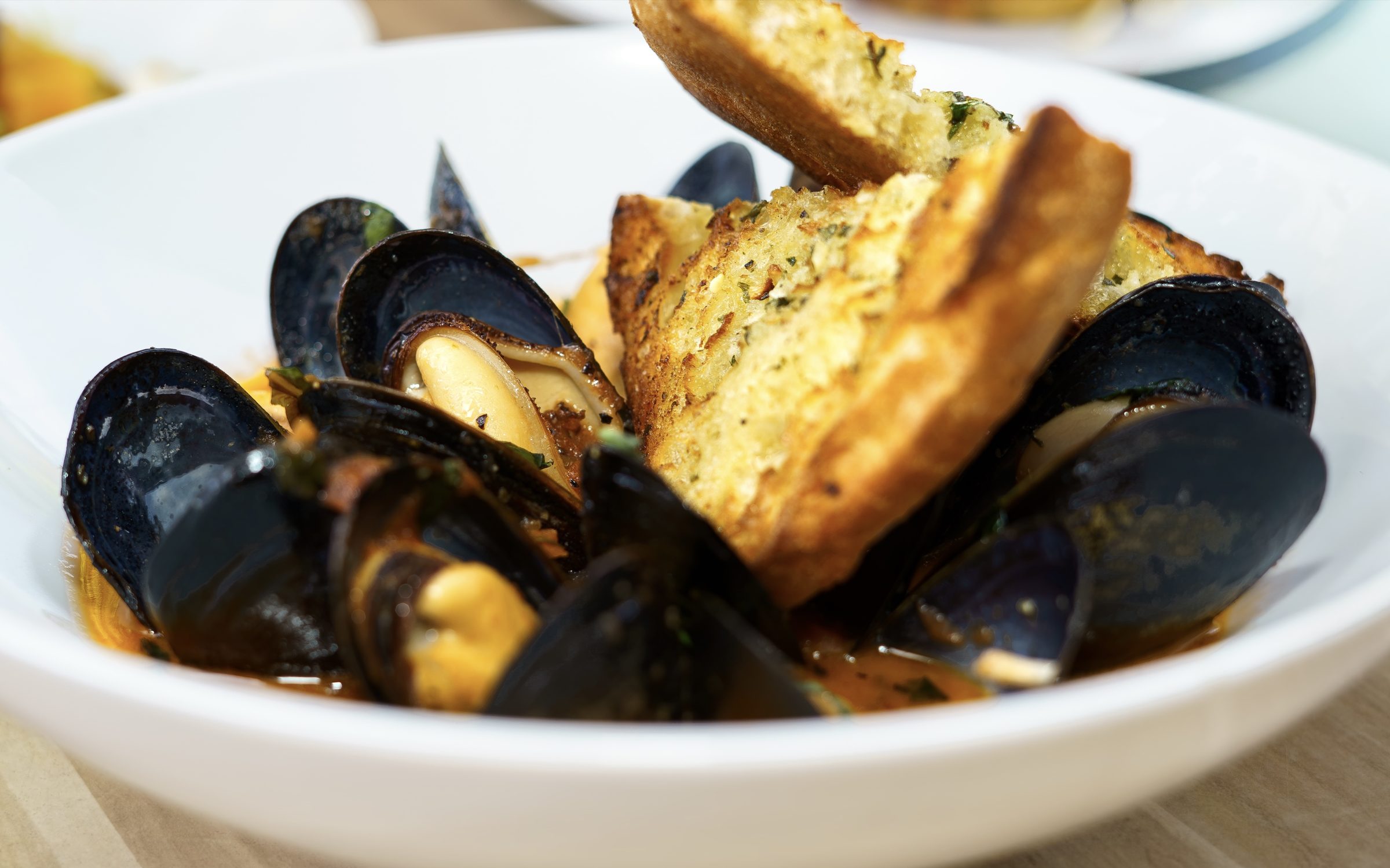 Mussels with garlic bread at Napkins Bar & Grill