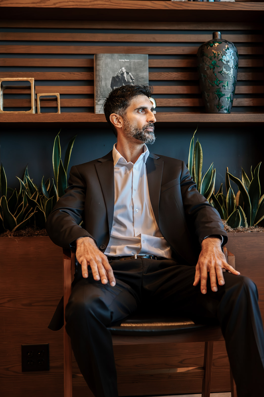 Moe, CEO of EverSpark Interactive, seated in the office