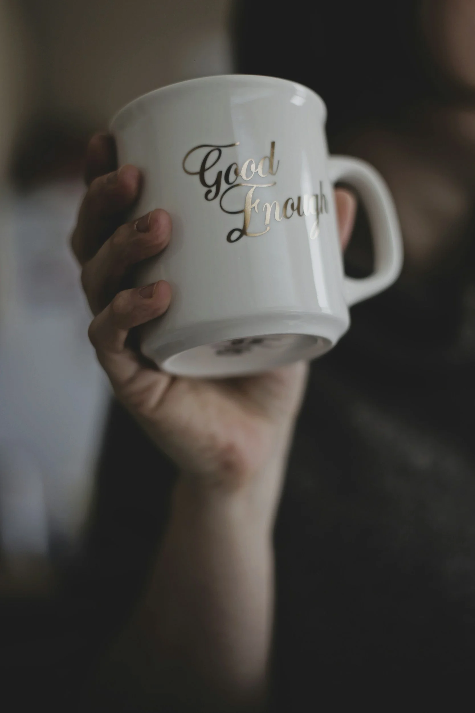 A picture of a cup that says "good enough" Child Therapist San Jose