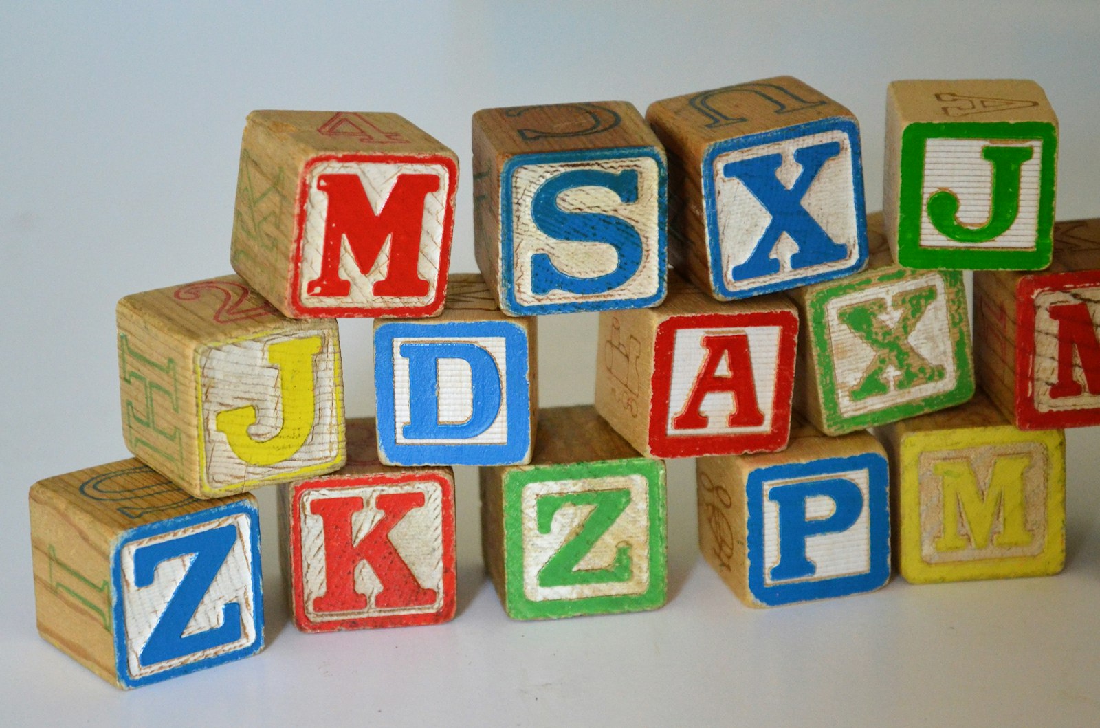 Wooden letter blocks on a table in a child therapy playroom at Your Therapy Nook in San Jose