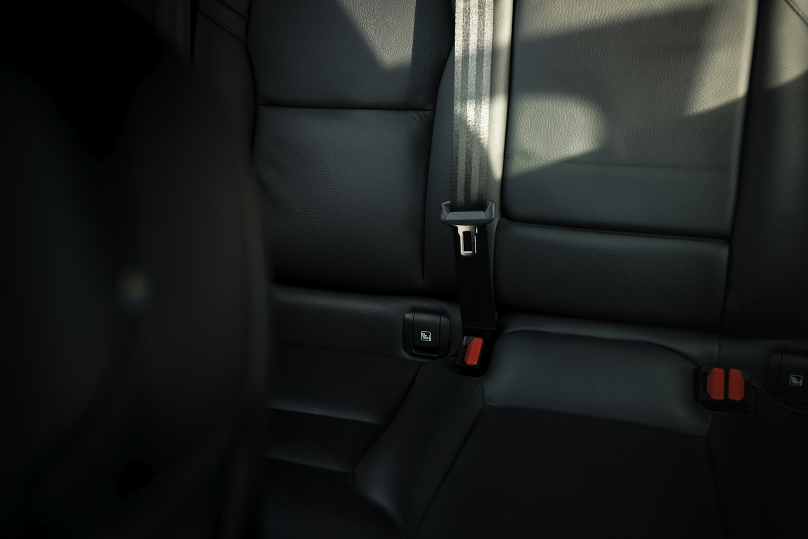 An empty back car seat after a hard school drop-off, child therapist San Jose