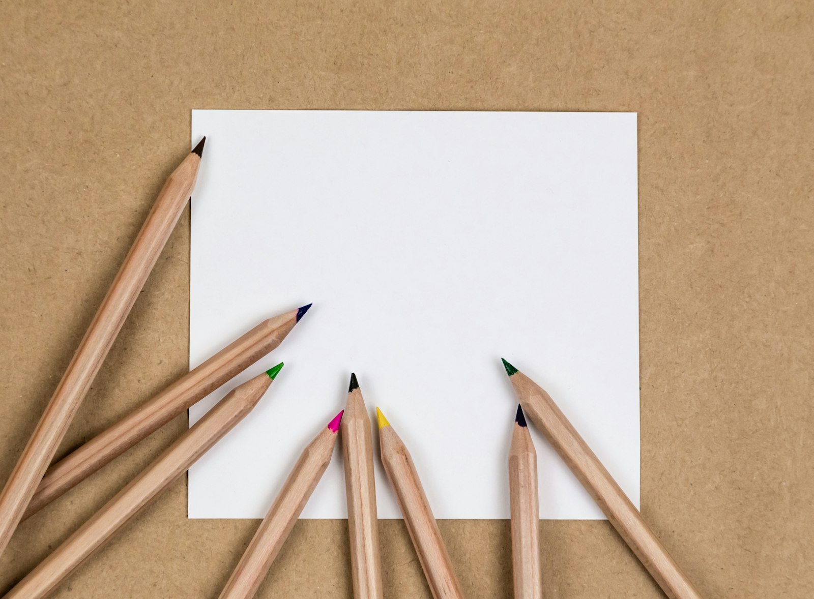 Colored pencils and a blank sheet of paper before homework, child therapist San Jose