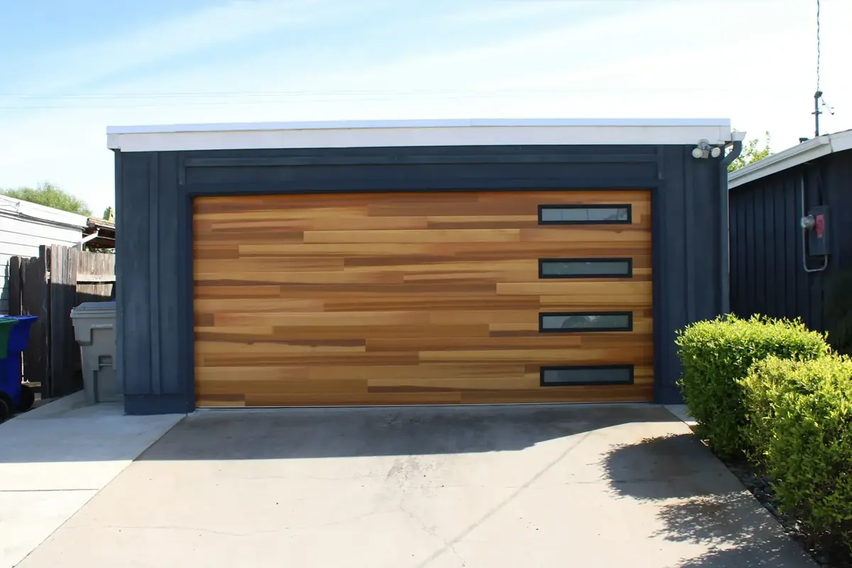 Modern wood garage door on a house