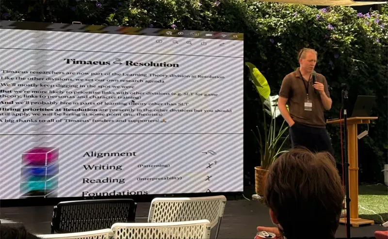 Outdoor Iliad talk beside a presentation screen