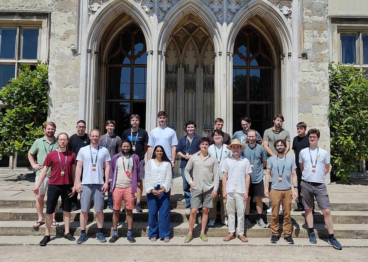Iliad Intensive participants standing together as a group.