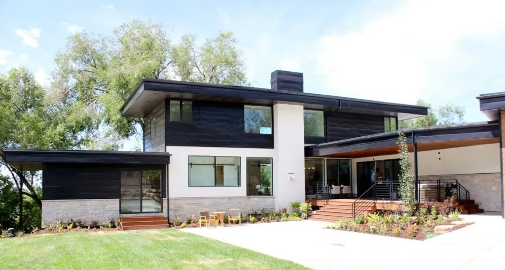Modern Utah home exterior featuring large black-framed AMSCO windows