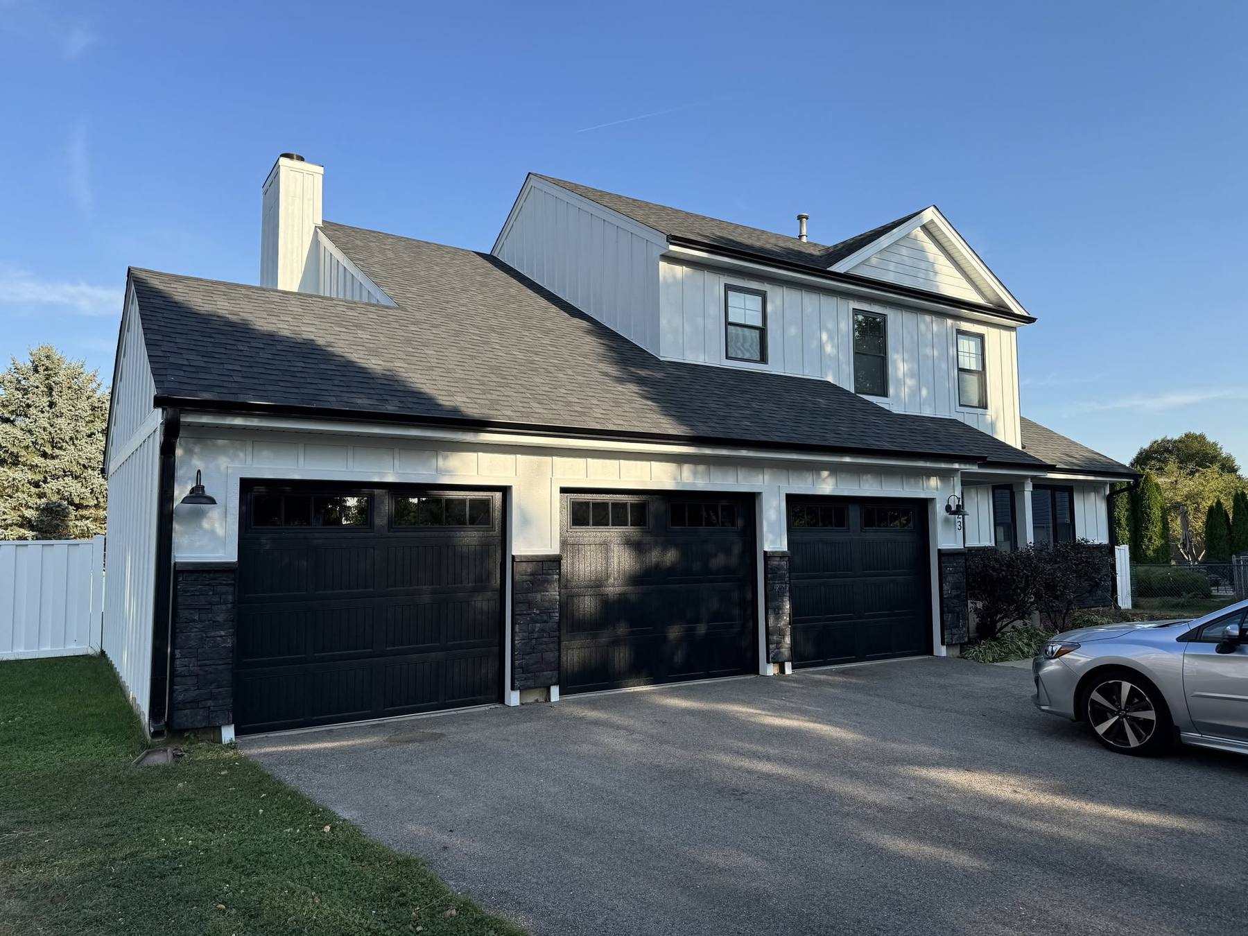 After: new board and batten siding on a Hanover Park, IL home