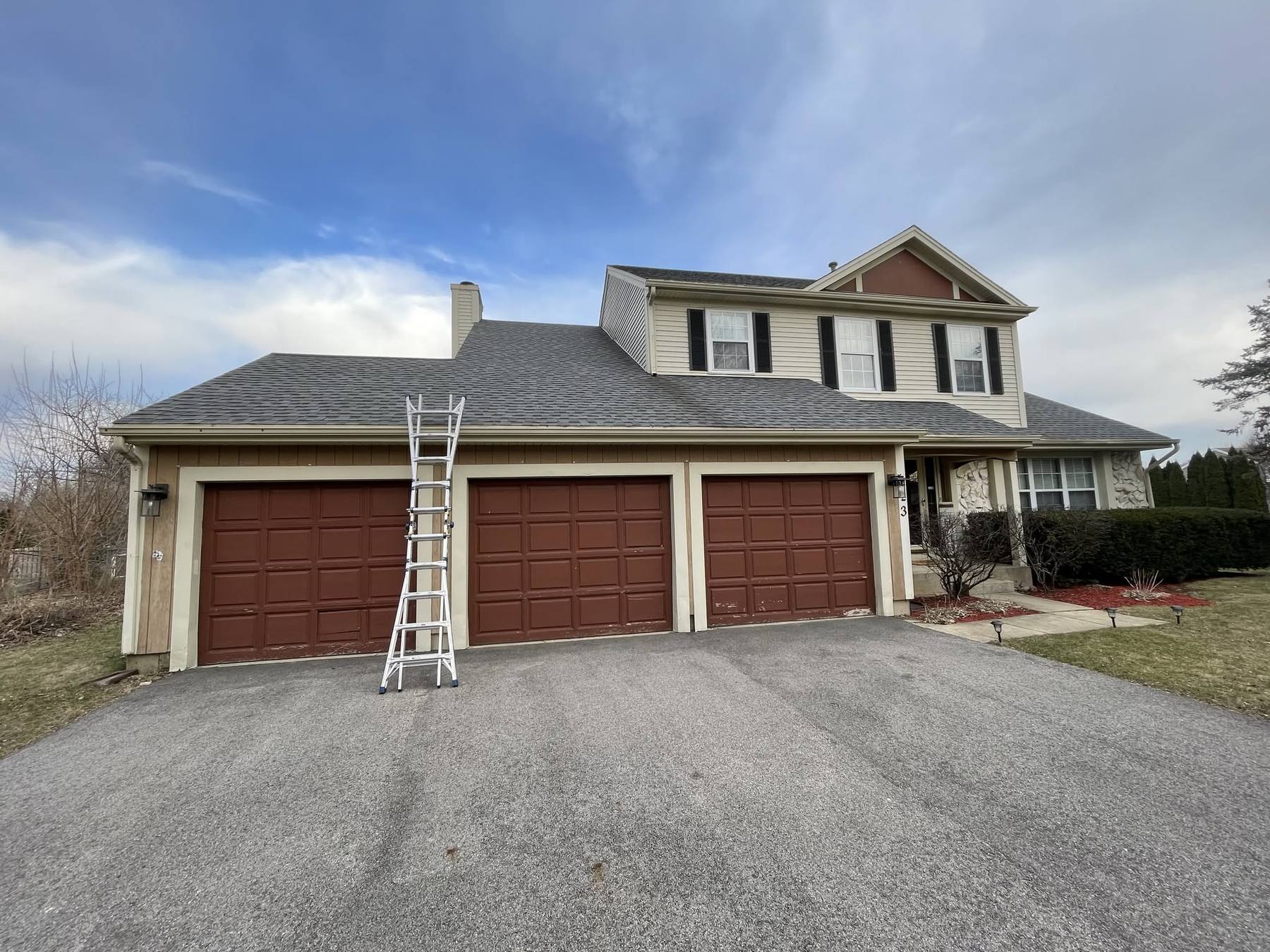 Before: a Hanover Park, IL home ahead of board and batten siding replacement