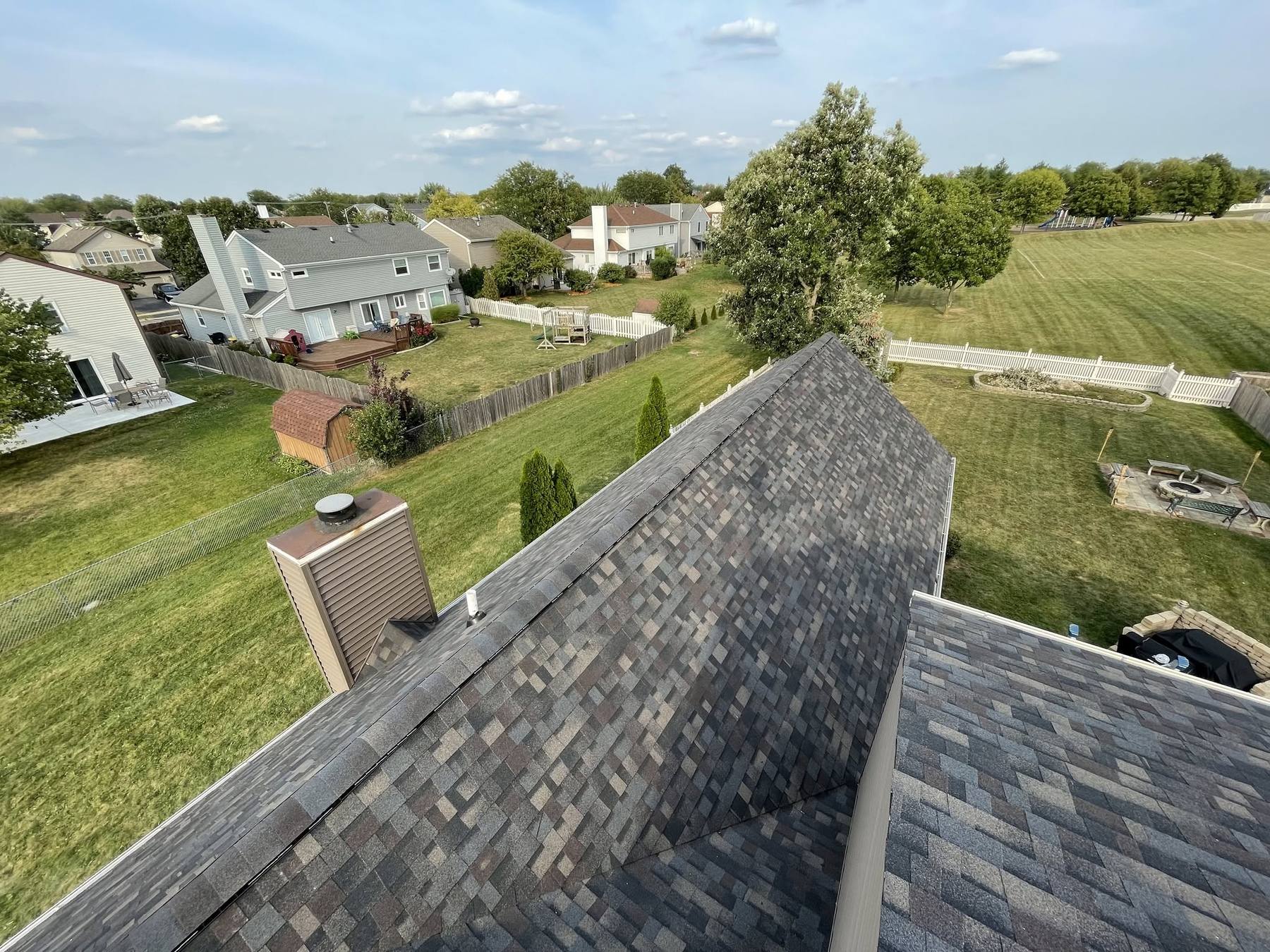 Charcoal architectural shingle roof installed on a Bartlett, IL home