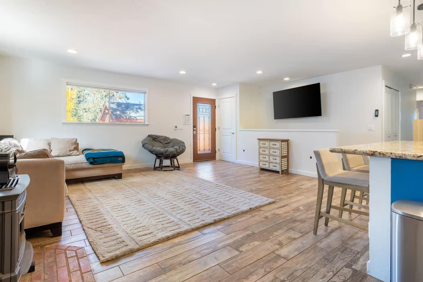 Living room with seating and television