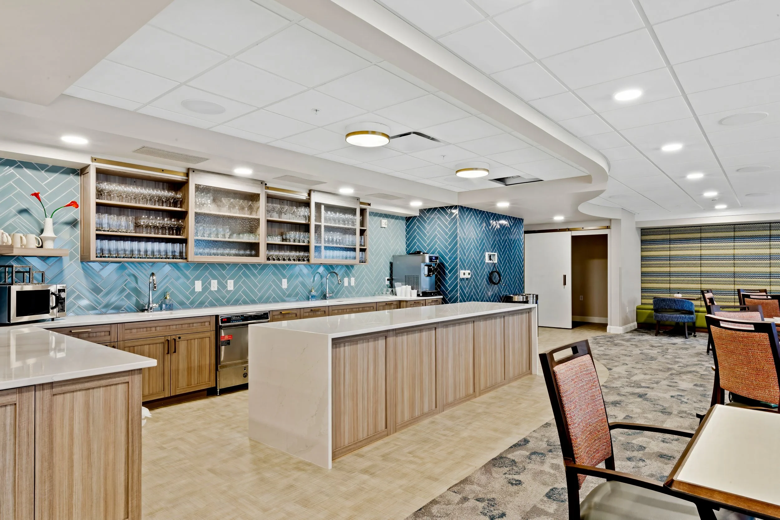 Immanuel Grand Lodge lounge in Lincoln with a serving counter, blue tile backsplash and open shelving