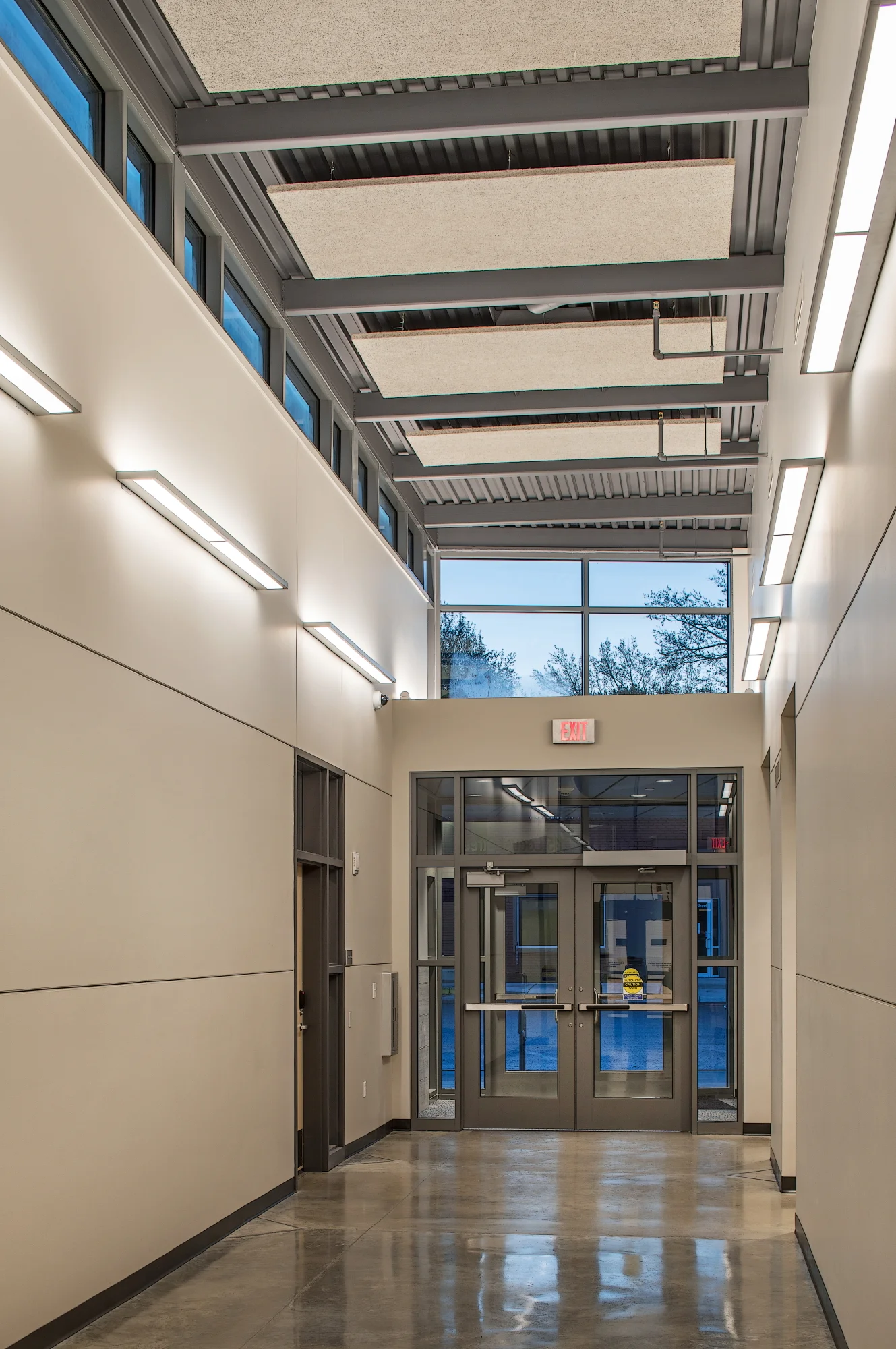 Main corridor with clerestory windows and polished concrete floor