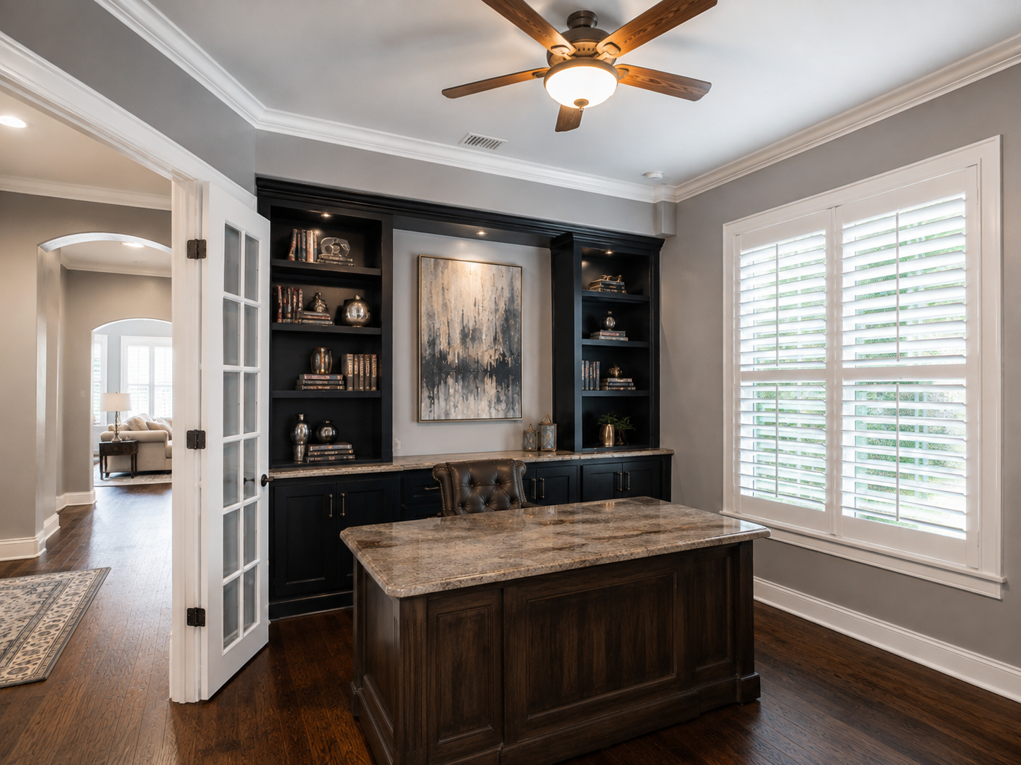 Crown molding meeting built-in cabinetry in a Florida home office