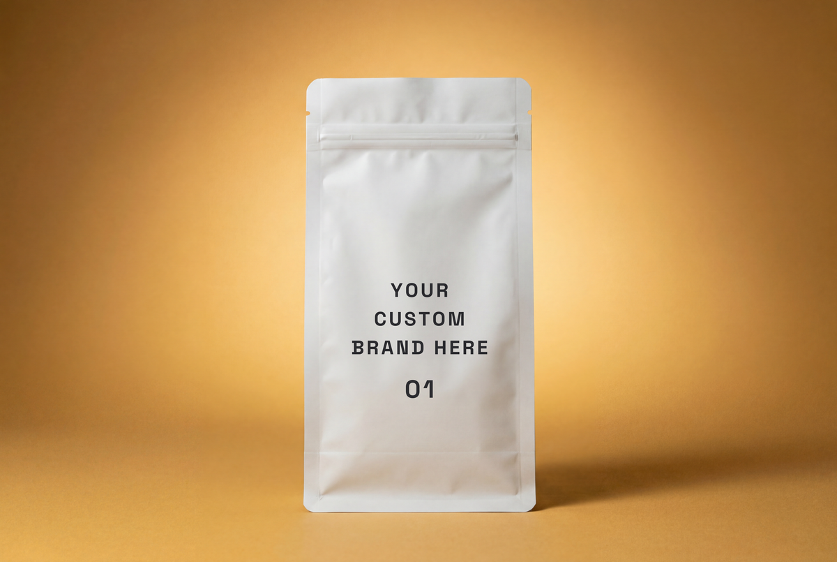 Plain white resealable pouch with text 'Your custom brand here 01' on a warm beige background.