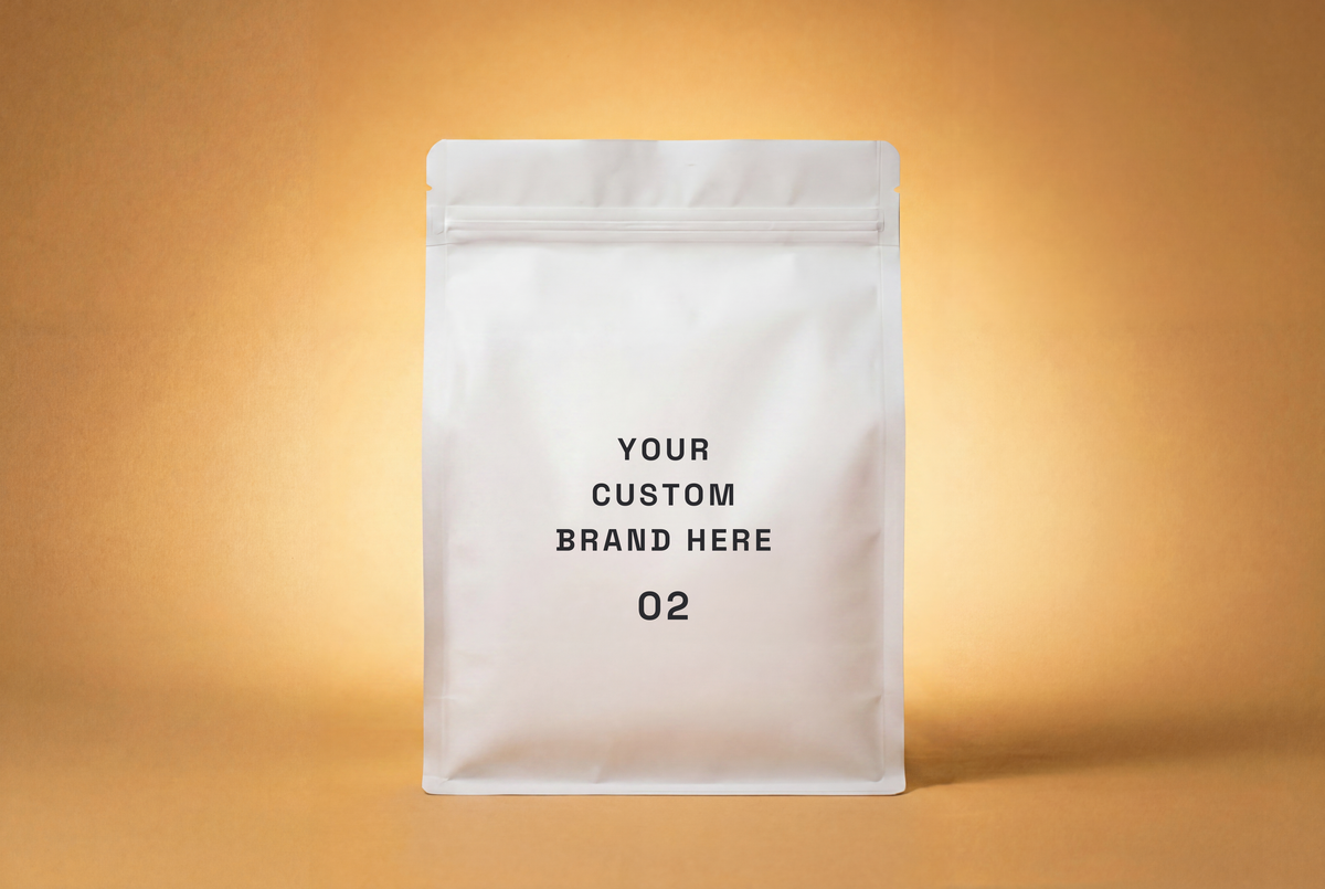 White resealable pouch with text 'Your Custom Brand Here 02' on a warm beige background.
