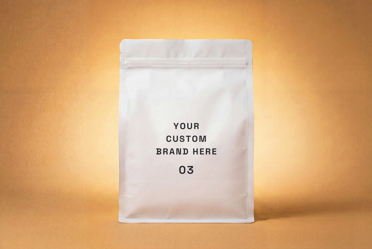 White resealable pouch with placeholder text for custom brand on a warm orange background.