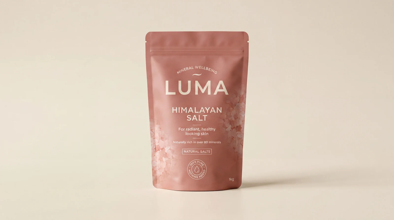 Pink pouch of LUMA Himalayan Salt for radiant, healthy skin, naturally rich in over 80 minerals, 1kg.