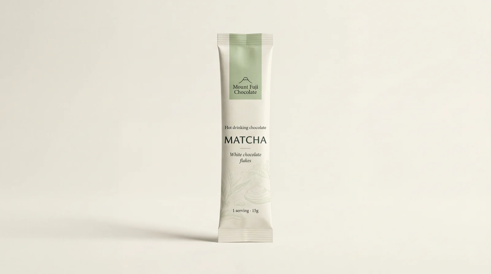 Stick pack of Mount Fuji Chocolate Matcha hot drinking chocolate with white chocolate flakes, 15g.