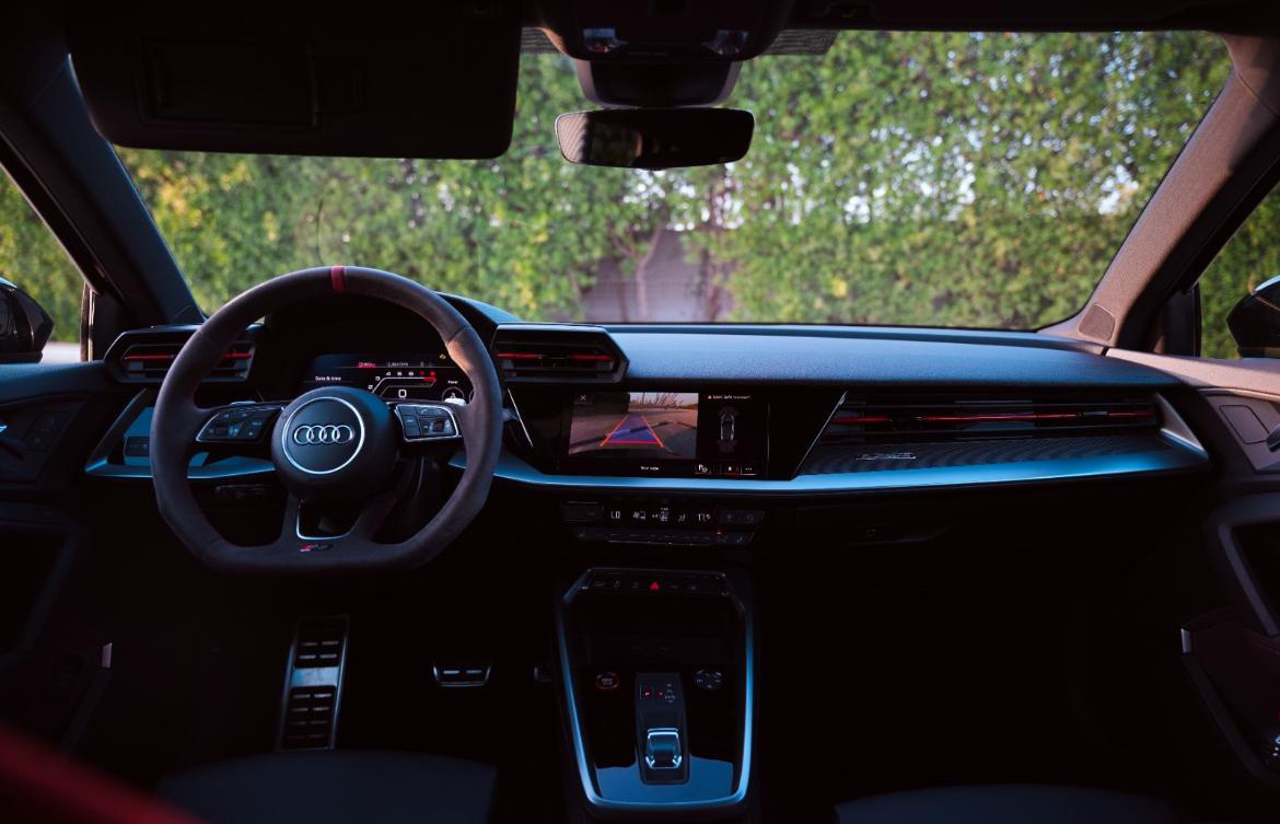 Interior of an Audi with digital dashboard and rearview camera display