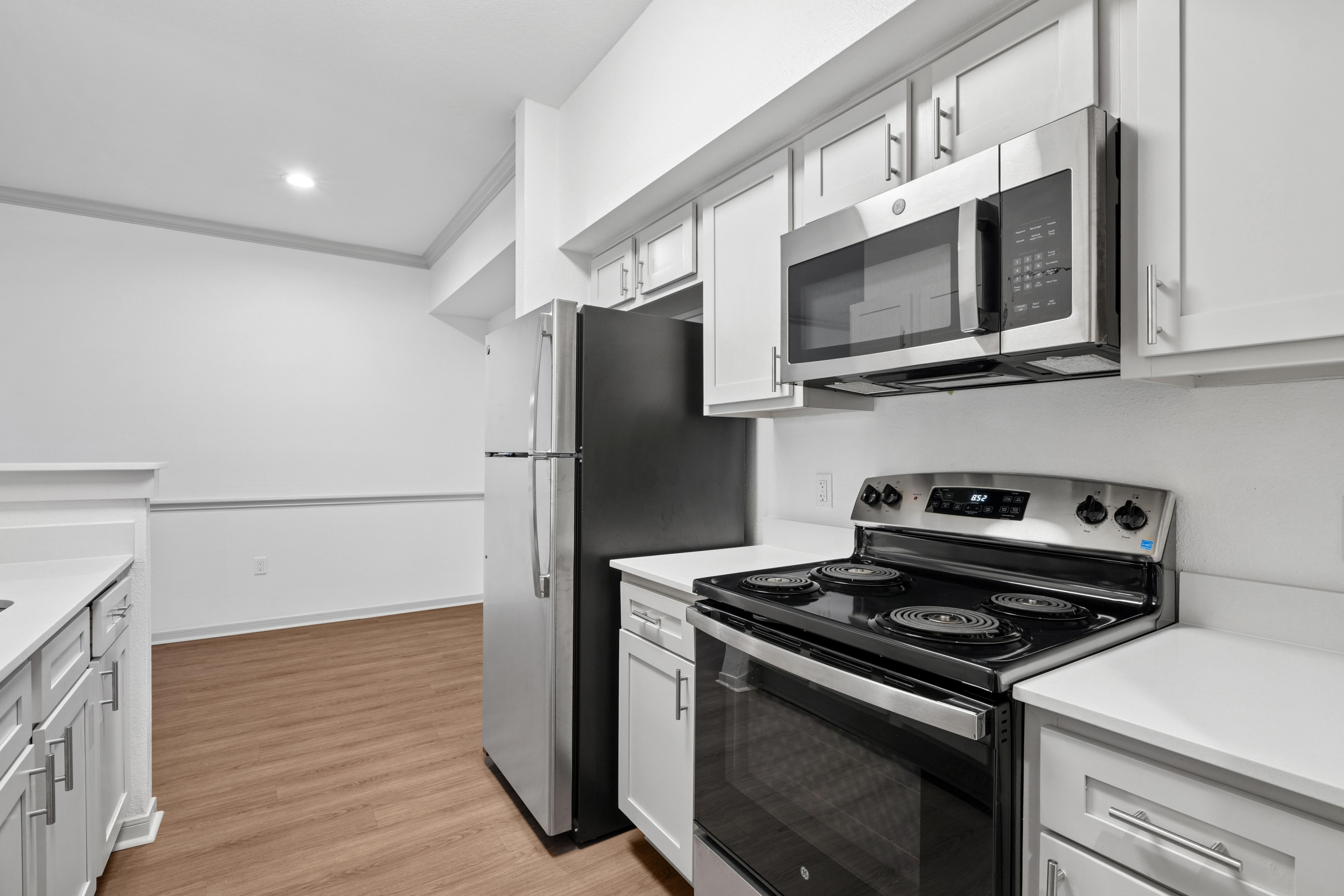 Open living room, dining room and kitchen area