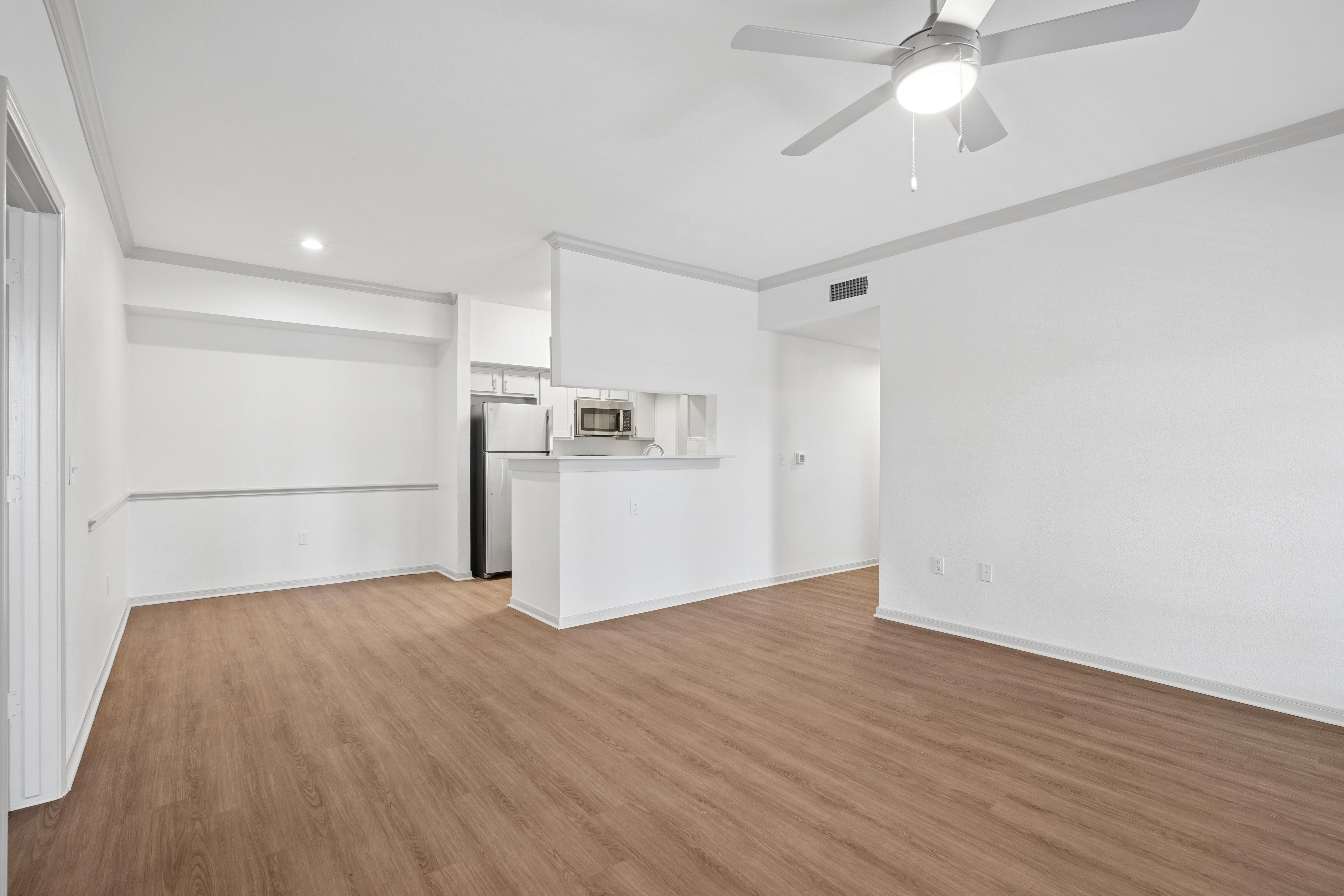 Open living room, dining room and kitchen area