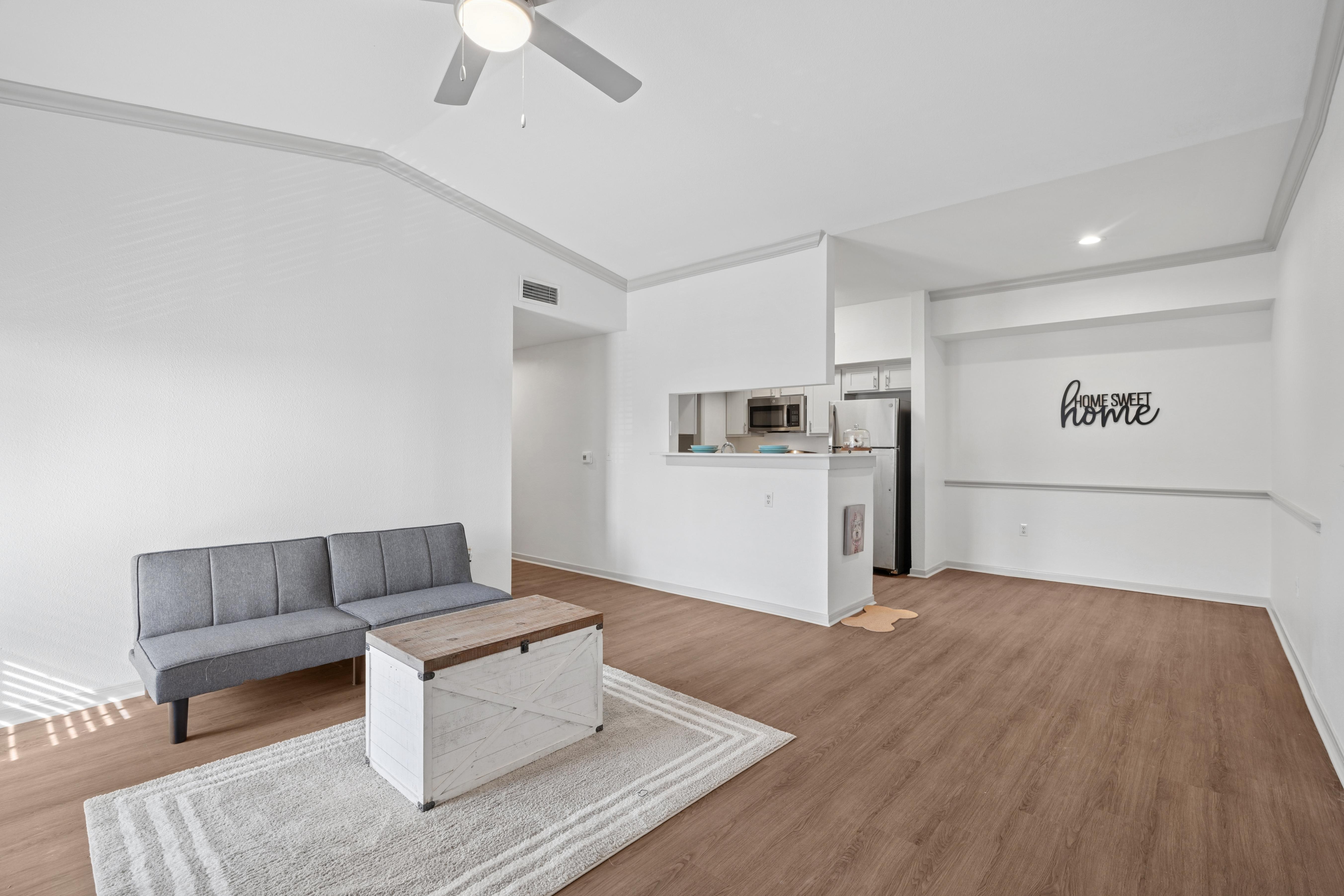 Open living room, dining room and kitchen area