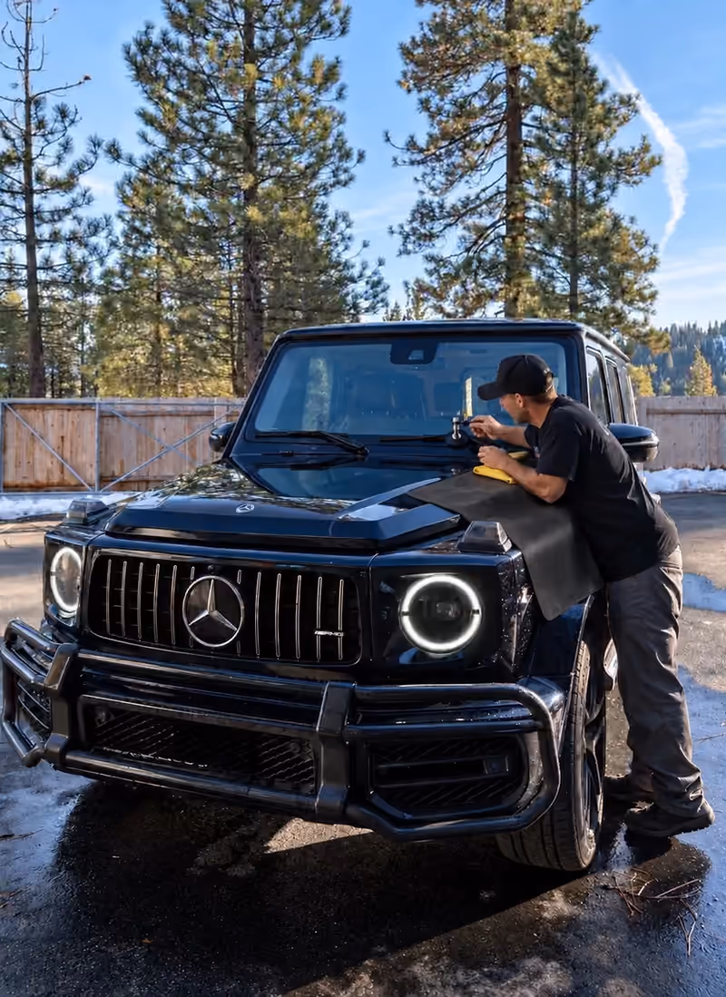 Technician repairing a windshield chip on a Mercedes-Benz G-Class in Truckee for Sierra Mobile Auto Glass & Calibration - Truckee.