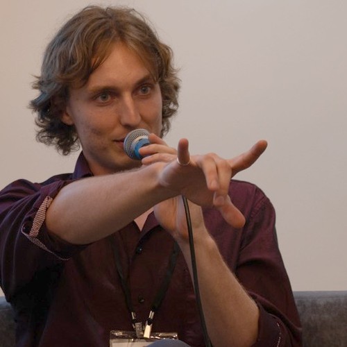 Blake Newcomer speaking on a panel at the Utility Innovation Summit