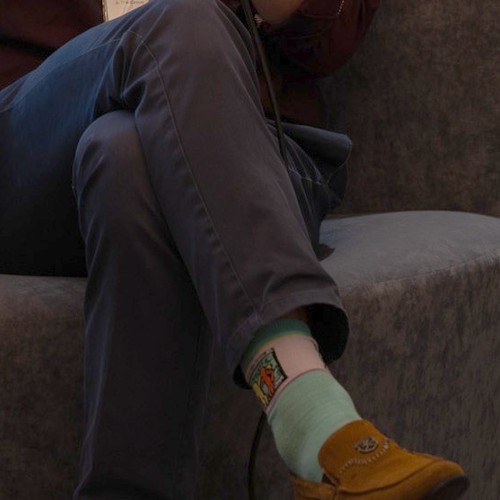 Blake Newcomer’s aqua patterned socks and tan loafers