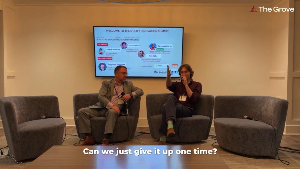 Blake Newcomer and Stephen Bennett of PJM Interconnection on stage at the Utility Innovation Summit