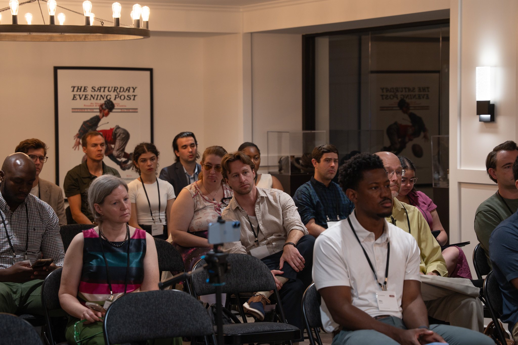 Attendees listening during a session