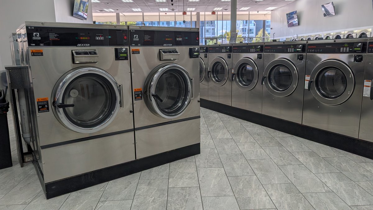 Large Dexter T-900 washers near the storefront windows