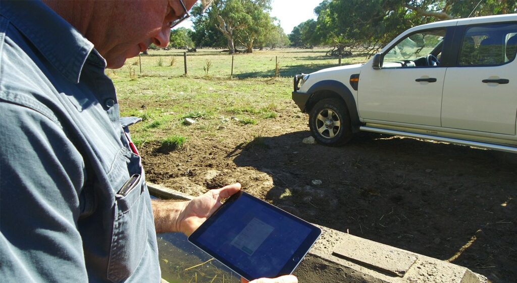 AgriWebb - Michael Cobiac with Ipad