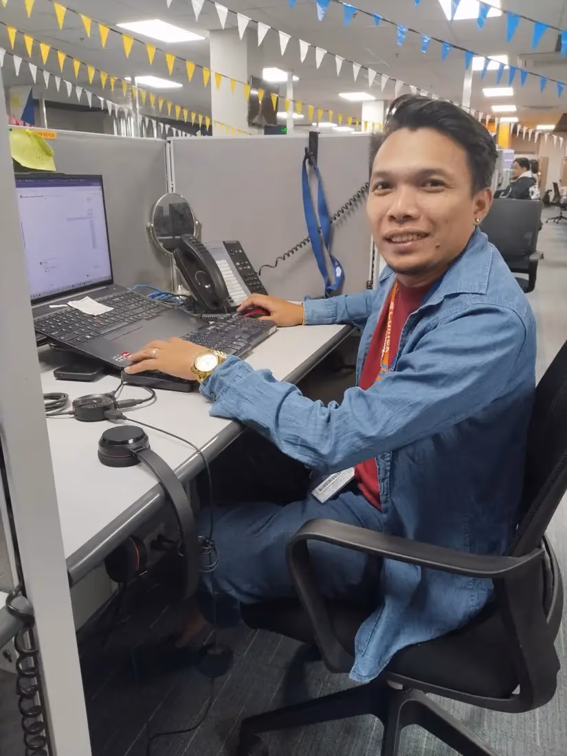 Adam at his workstation in the CallTek office