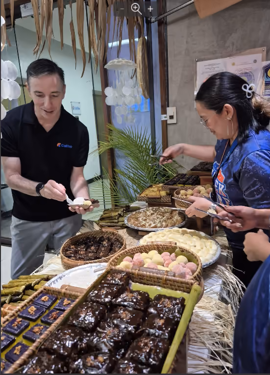 CallTek team members sharing a meal together