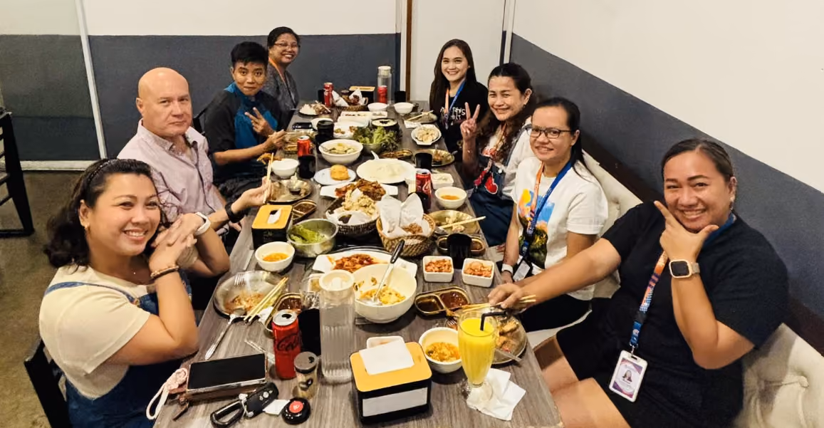 CallTek team members sharing a meal together