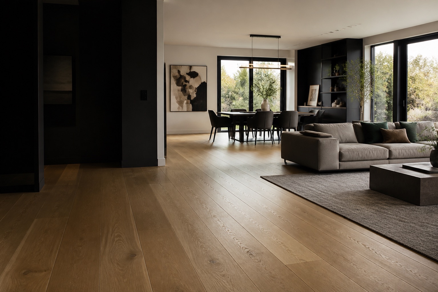 Warm renovated interior with wide-plank wood flooring