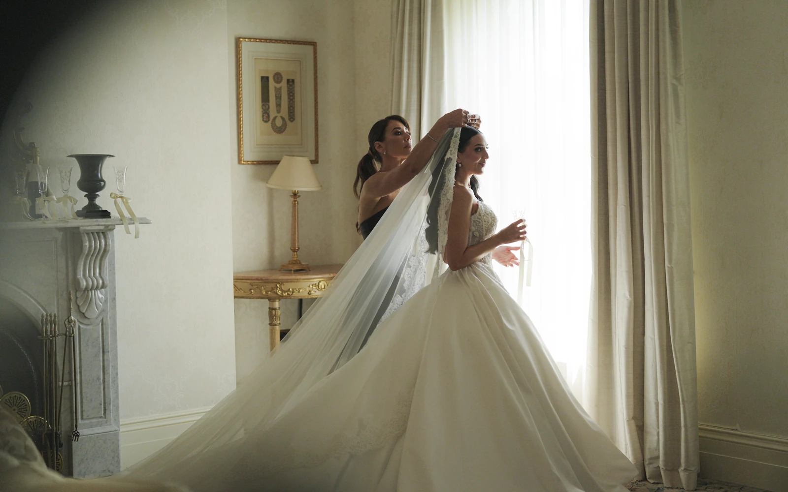 A veil being arranged beside a window