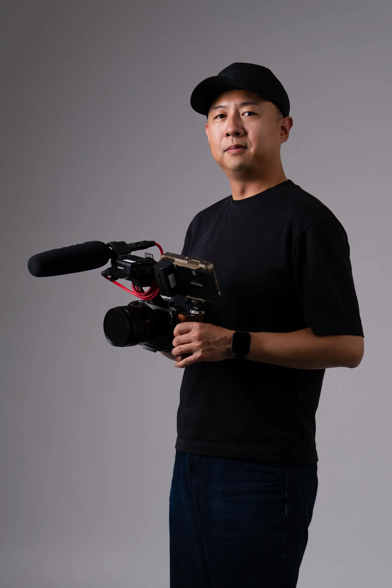 Martin holding his filmmaking camera rig.