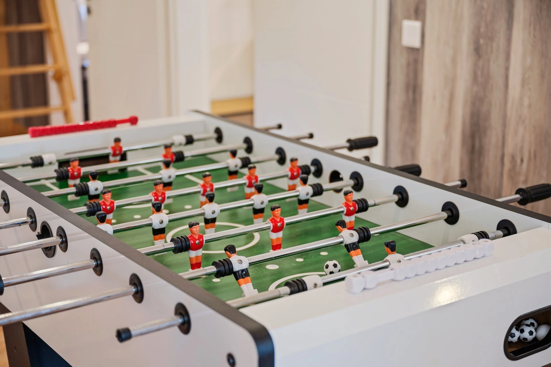 Kickertisch im Aufenthaltsraum des Hauses