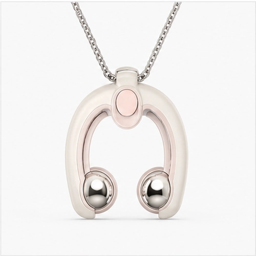 The rollerball massage necklace worn closed, pendant hanging on the chain