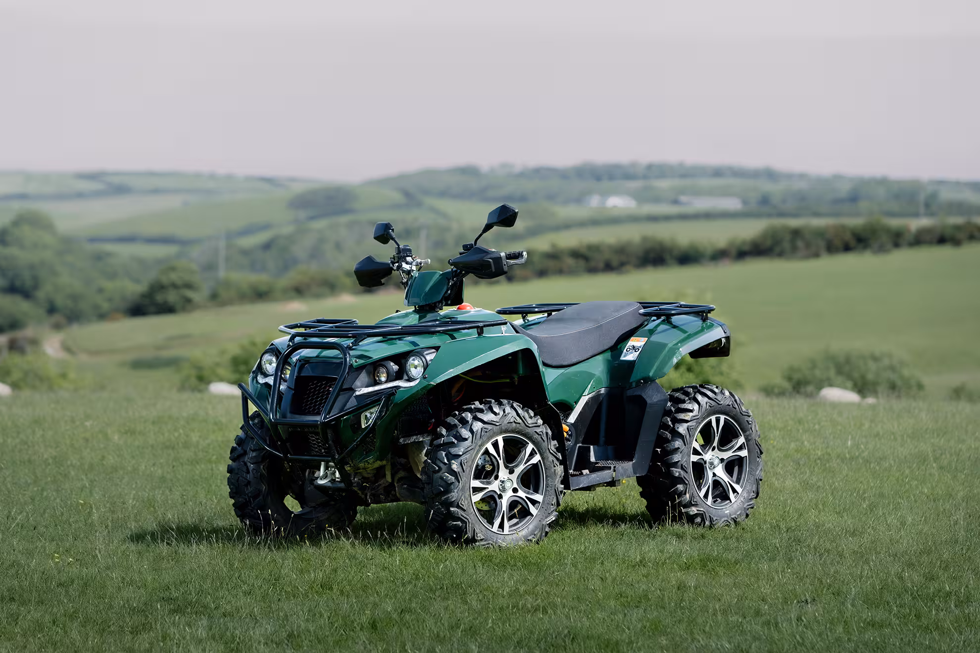 image of a VQ quad bike on a green hill