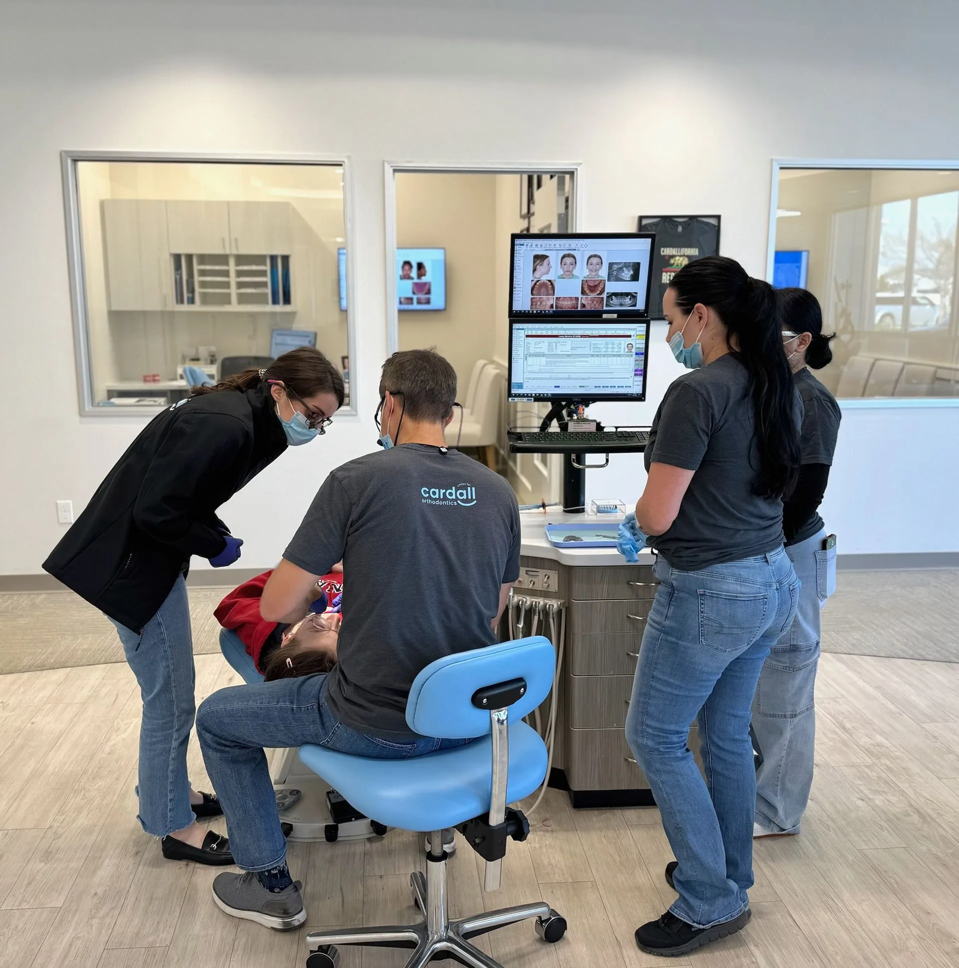 Dr. Wes Cardall and his team treating a patient at Cardall Orthodontics in Bakersfield