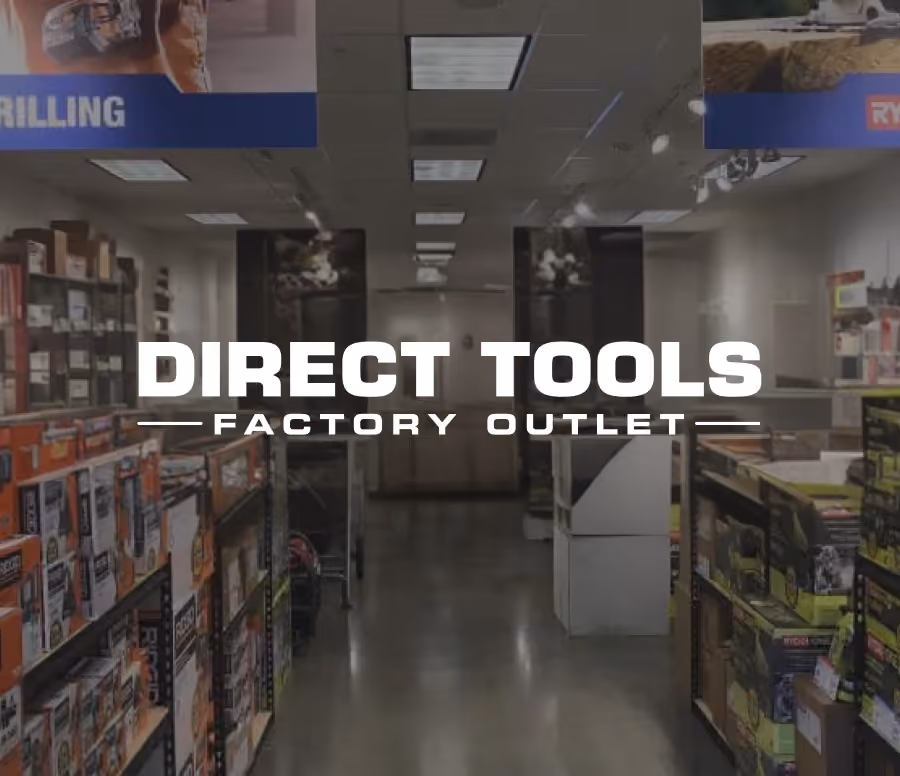 Interior view of a tool factory outlet store with shelves stocked with boxed power tools and accessories, featuring the text Direct Tools Factory Outlet.