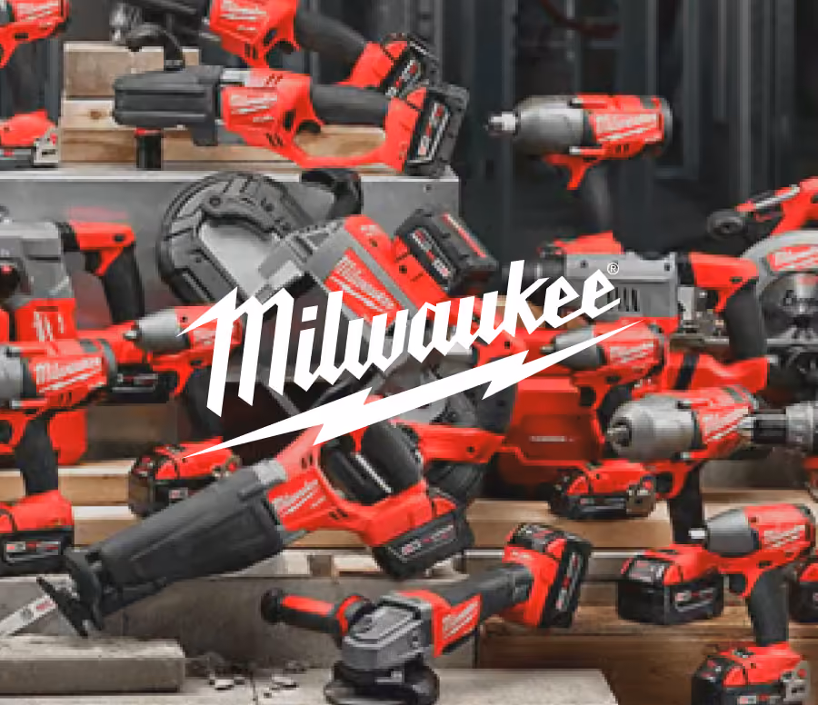 A collection of red and black Milwaukee power tools including drills, saws, and impact drivers arranged against wooden and metal backgrounds with the white Milwaukee logo and lightning bolt symbol overlayed in the center.