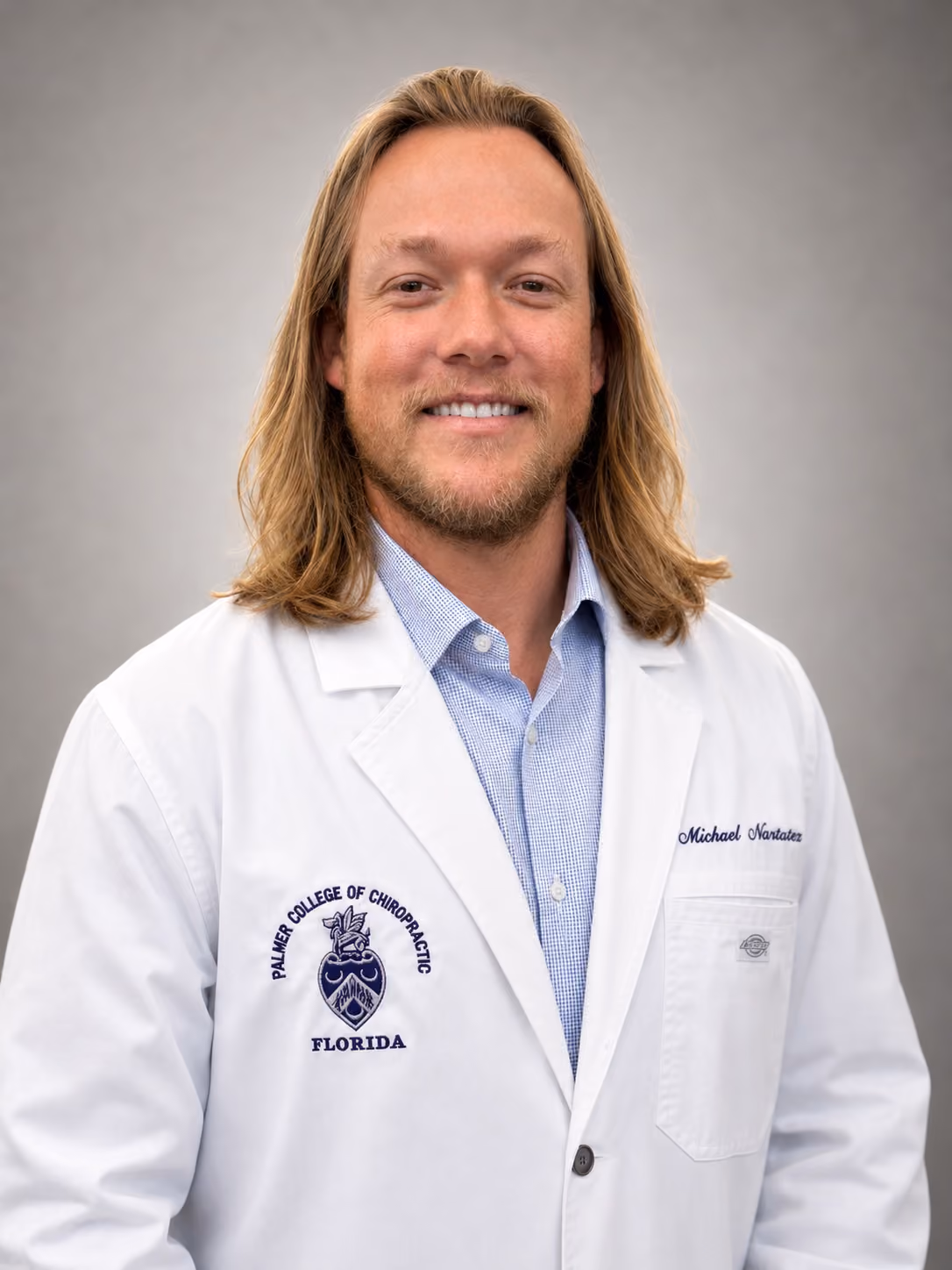 headshot of Dr. Michael Nartatez