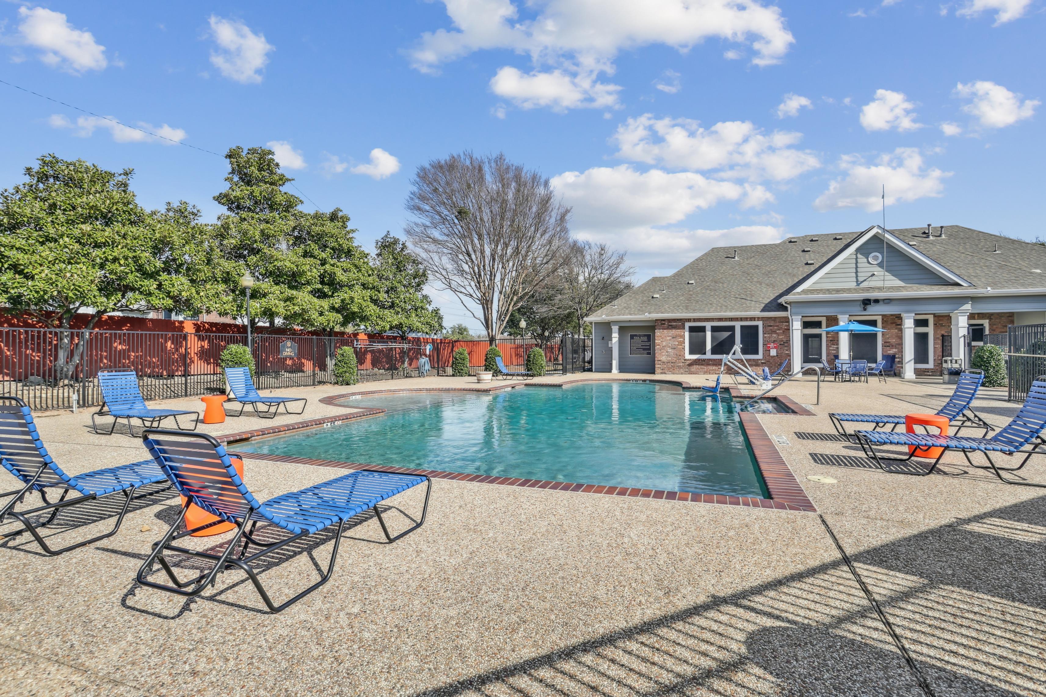 Pool deck with seating and large swimming pool