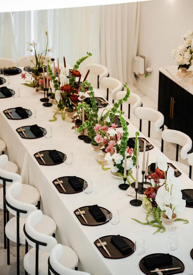 Black and white dinner event by POSH Rentals