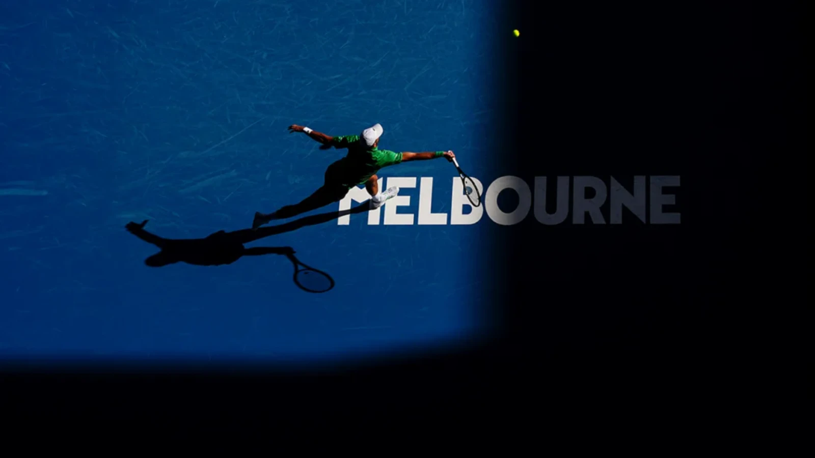 Overhead shot of a male tennis player in action at the Australian Open.