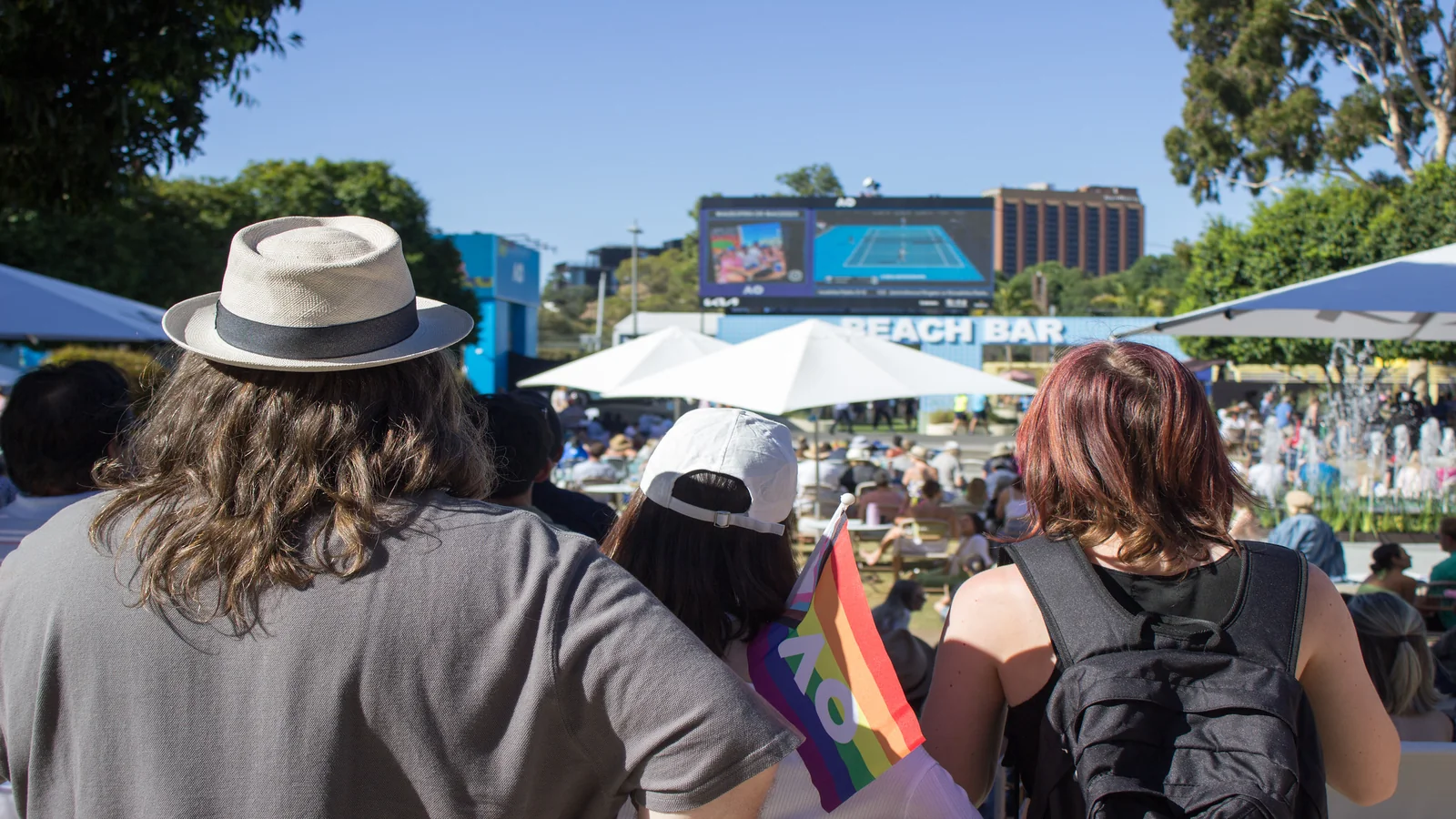 Crowds watching Rod Laver Arena tennis match on big screen in Garden Square during the 2023 Australian Open
